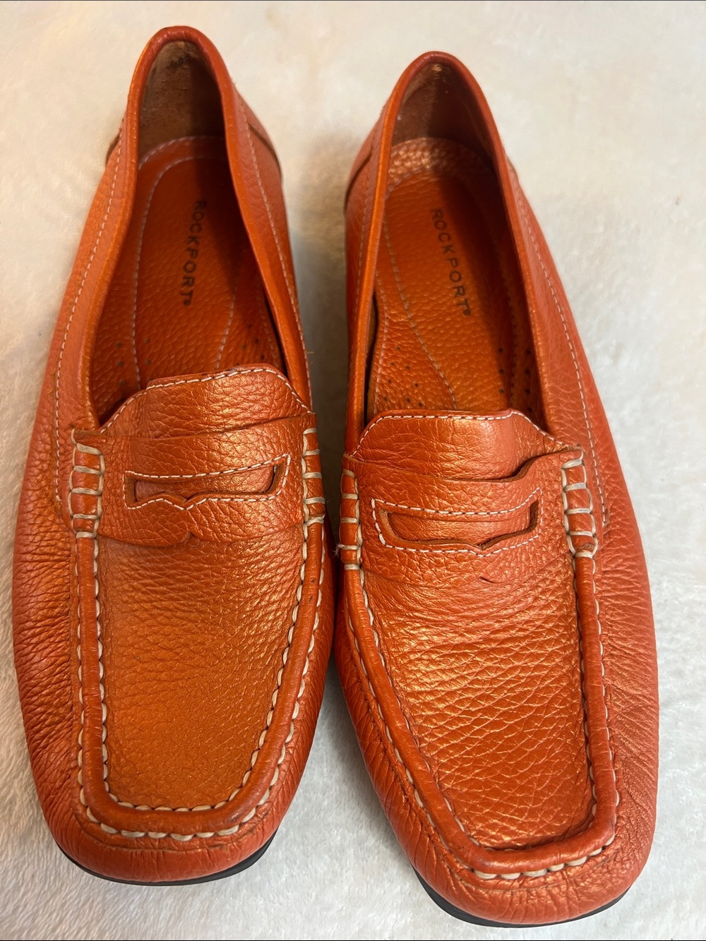 Rockport women’s orange pebbled leather square toe penny loafers